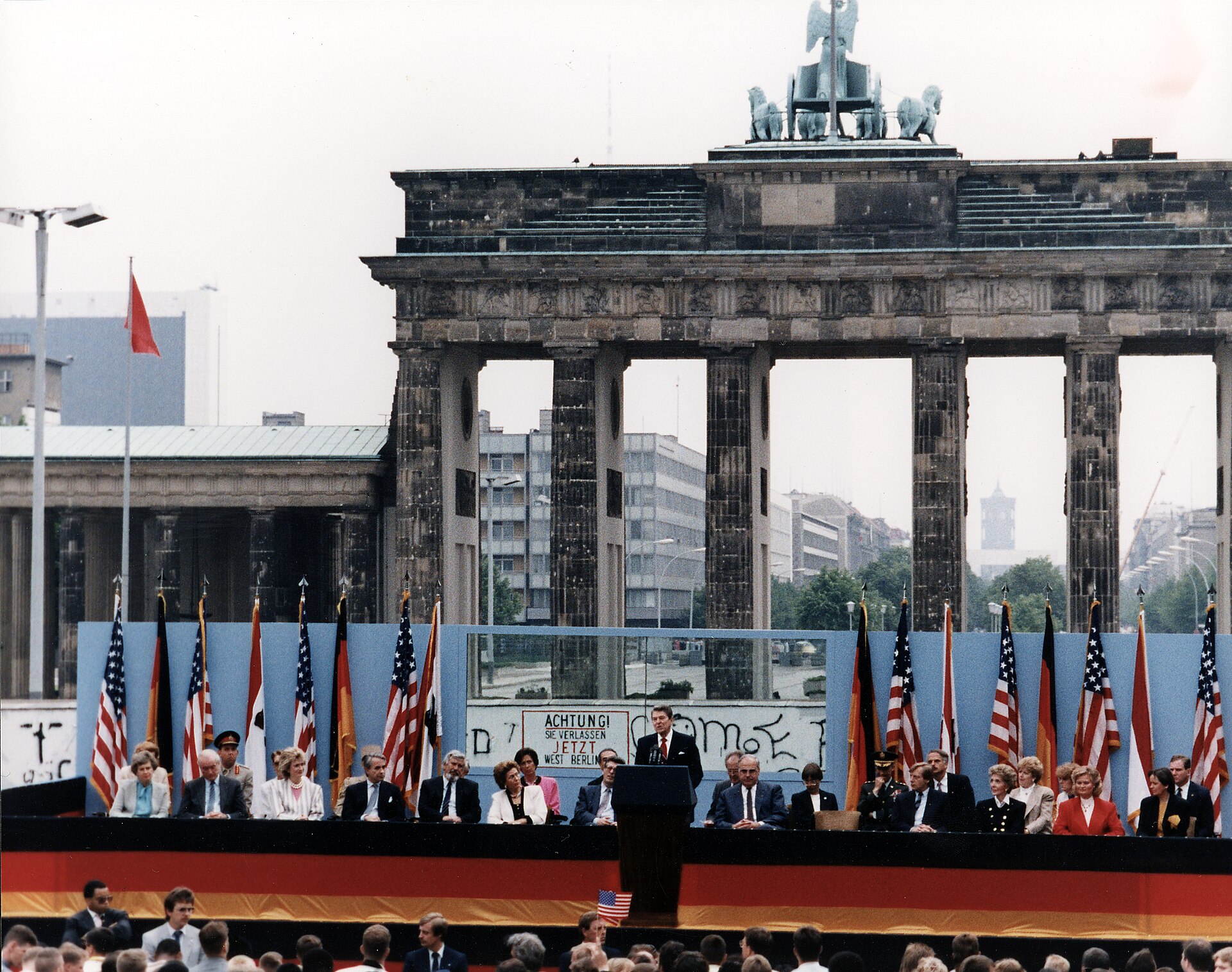 President Ronald Reagan speaking in front of the Brandenburg Gate and the Berlin Wall on 12 June 1987