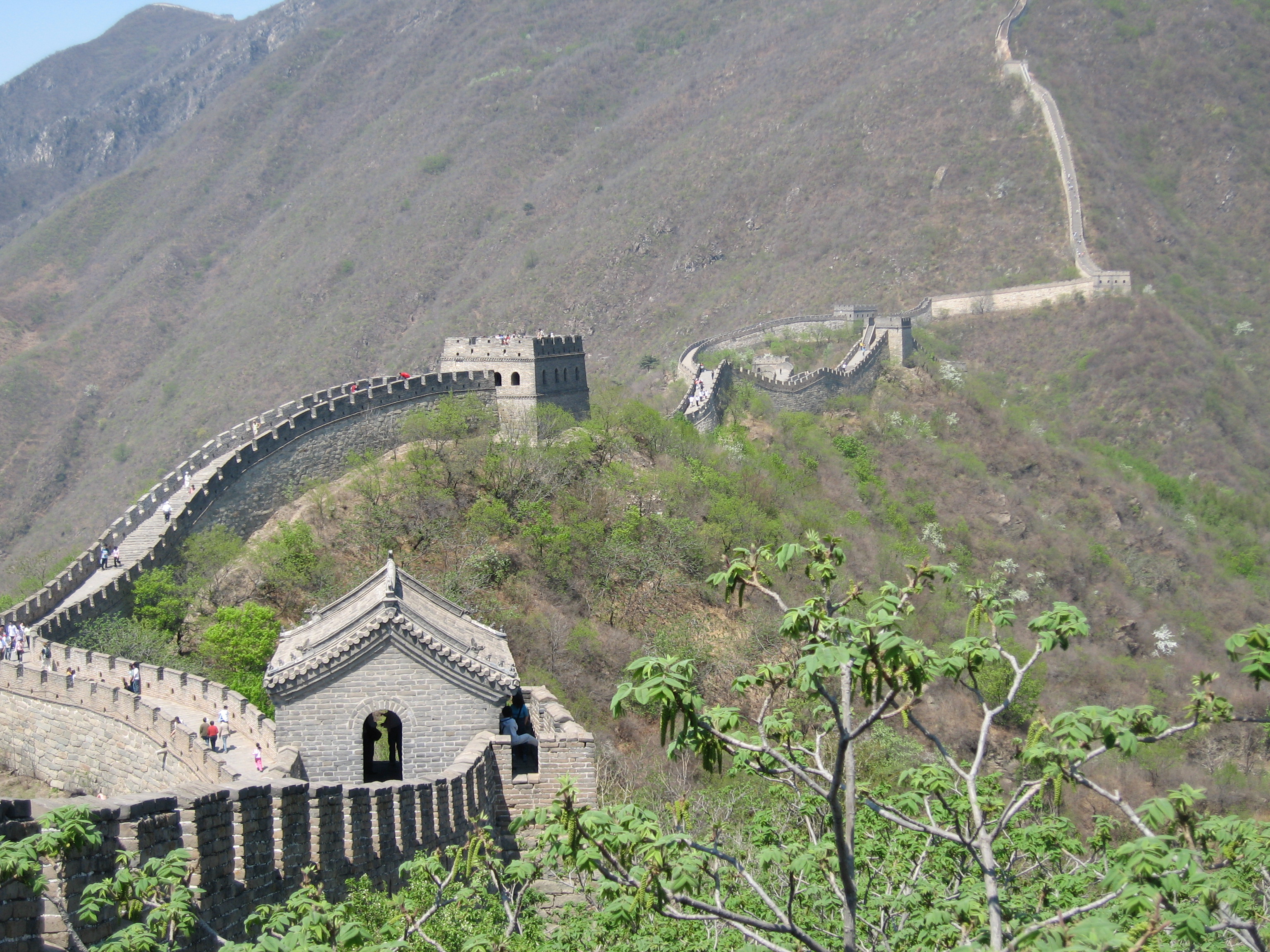 The stone-and-brick Ming-era Great Wall at Mutianyu, northeast of Beijing, running along a forested mountain ridge