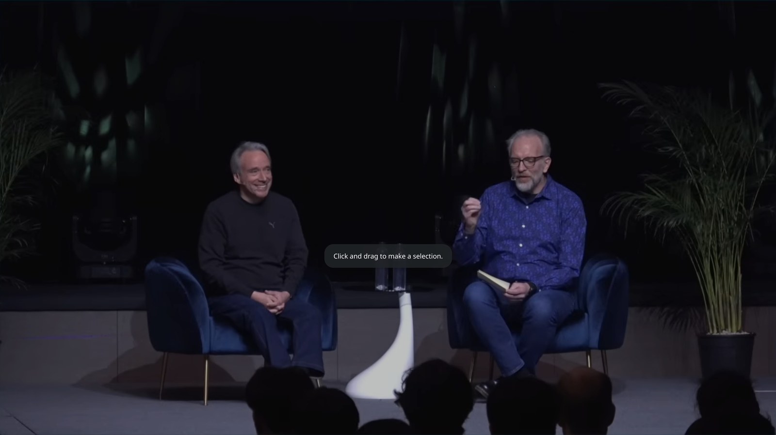 Linus Torvalds on stage in conversation with Dirk Hohndel at a Linux Foundation event
