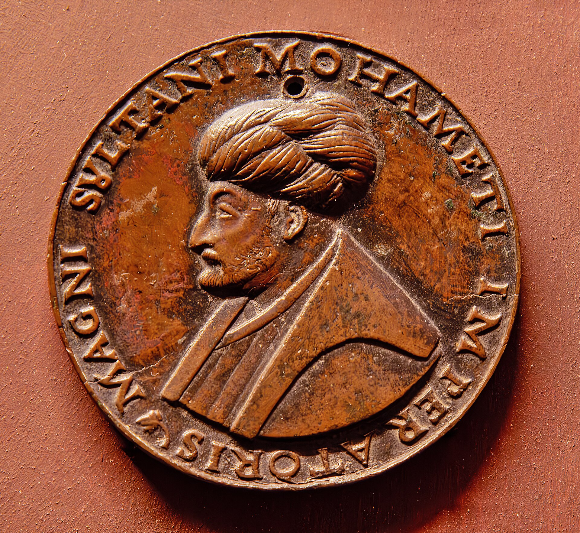 Renaissance portrait of Sultan Mehmed II by Gentile Bellini, showing the sultan in profile under an arch