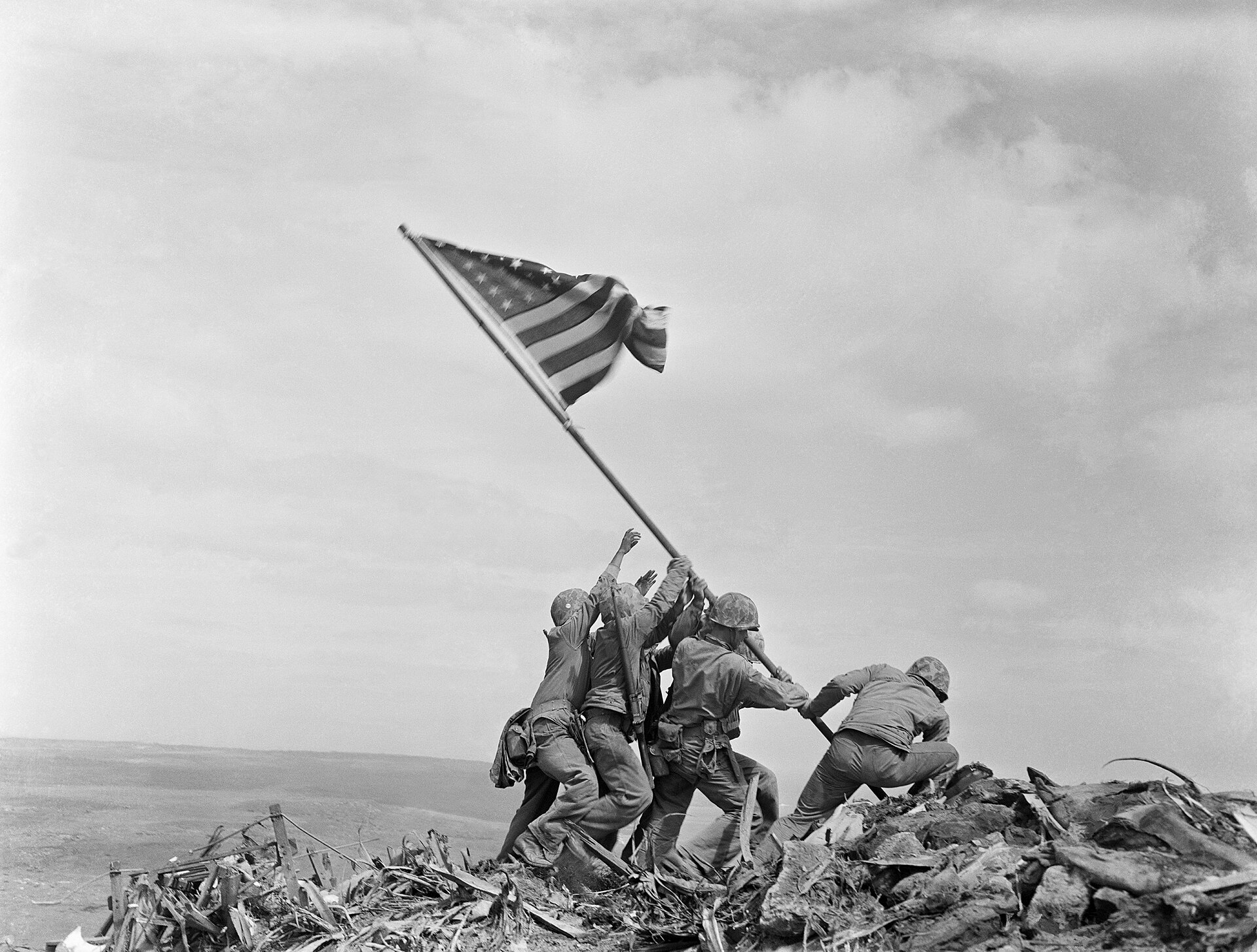 US Marines raise the American flag on Mount Suribachi during the Battle of Iwo Jima